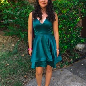 Olive green satin dress with lace on back. Beautiful homecoming dress size 6.